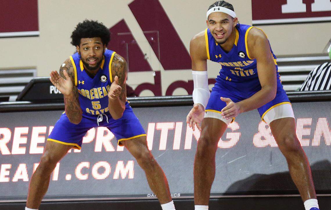 Morehead State’s Johni Broome (right) and Skyelar Potter cheered from the bench during the Eagles’ 71-68 loss at Eastern Kentucky on Dec. 7. Broome scored 13 points in the game. The Eagles have won 12 in a row and have not been defeated since a loss at Clemson on Dec. 21.