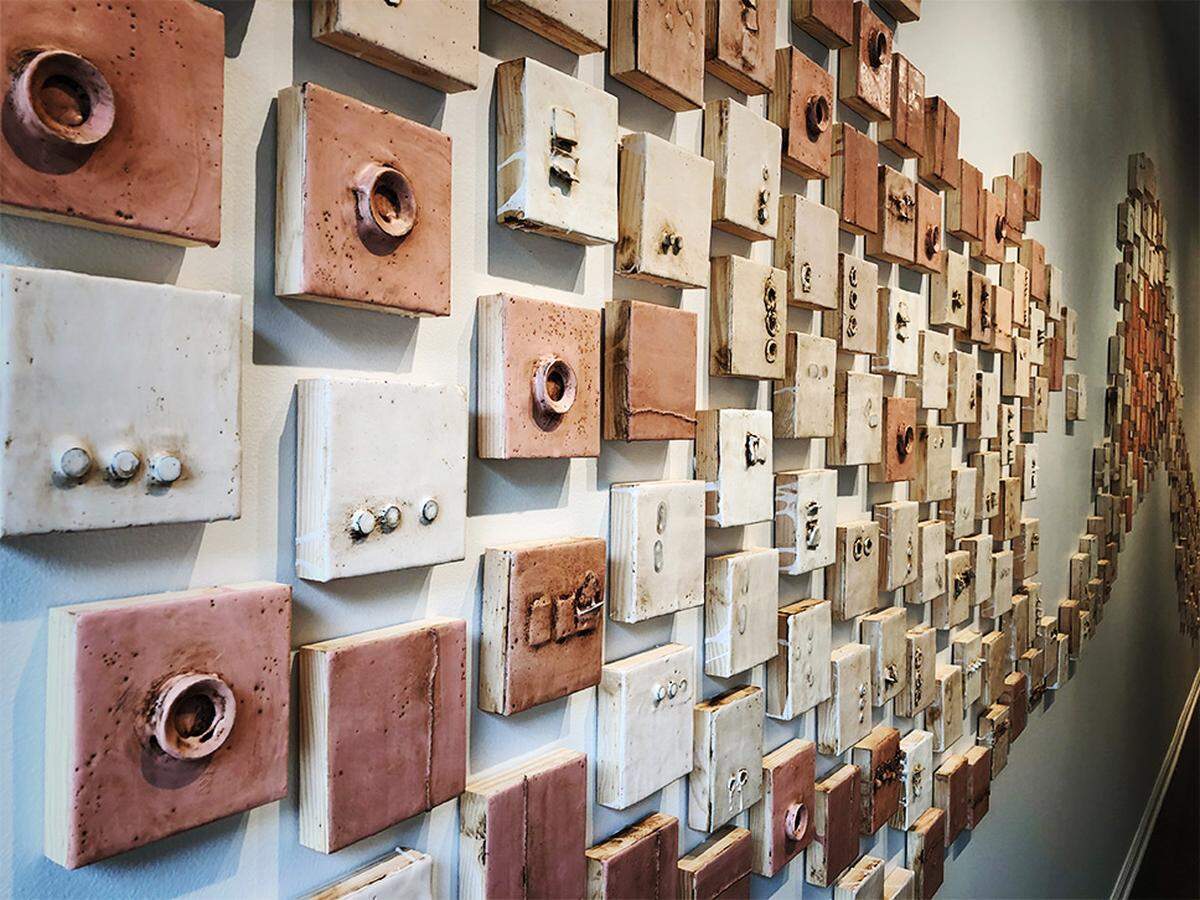 Artist Patricia Baldwin Seggebruch worked on 3,000 4-inch by 4-inch panels on display at New Editions Gallery.