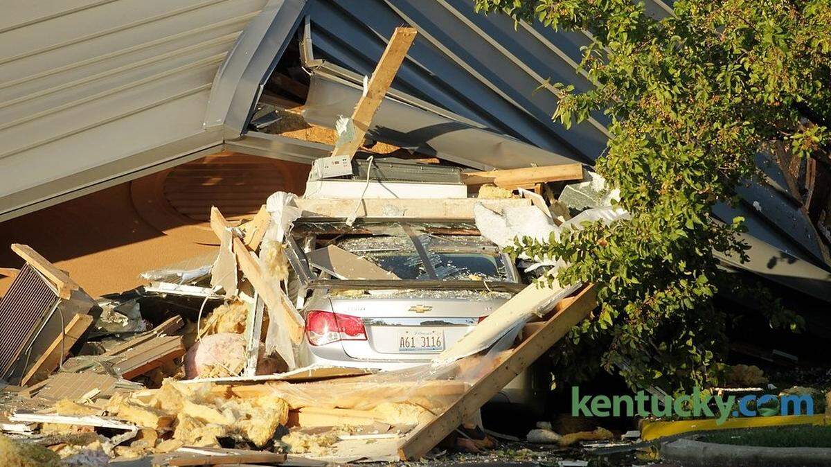 Firefighters and worked at the scene of a gas explosion that destroyed part of the Fairfield Inn and Suites at Beaumont Center in Lexington, Ky., on Sept. 8, 2014.  Photo by Pablo Alcala | Staff