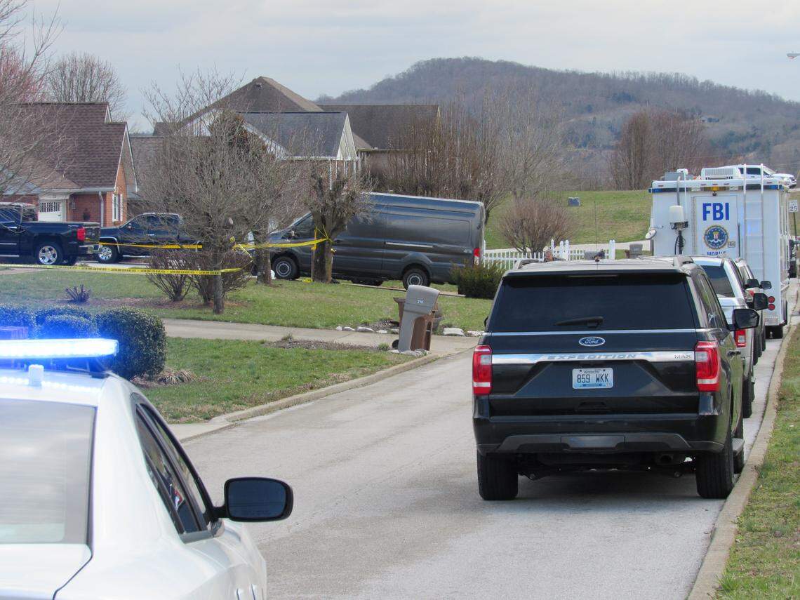 Police blocked a street in Somerset on as FBI agents investigate a shooting that occurred when agents tried to arrest a constable early on March 6, 2020.
