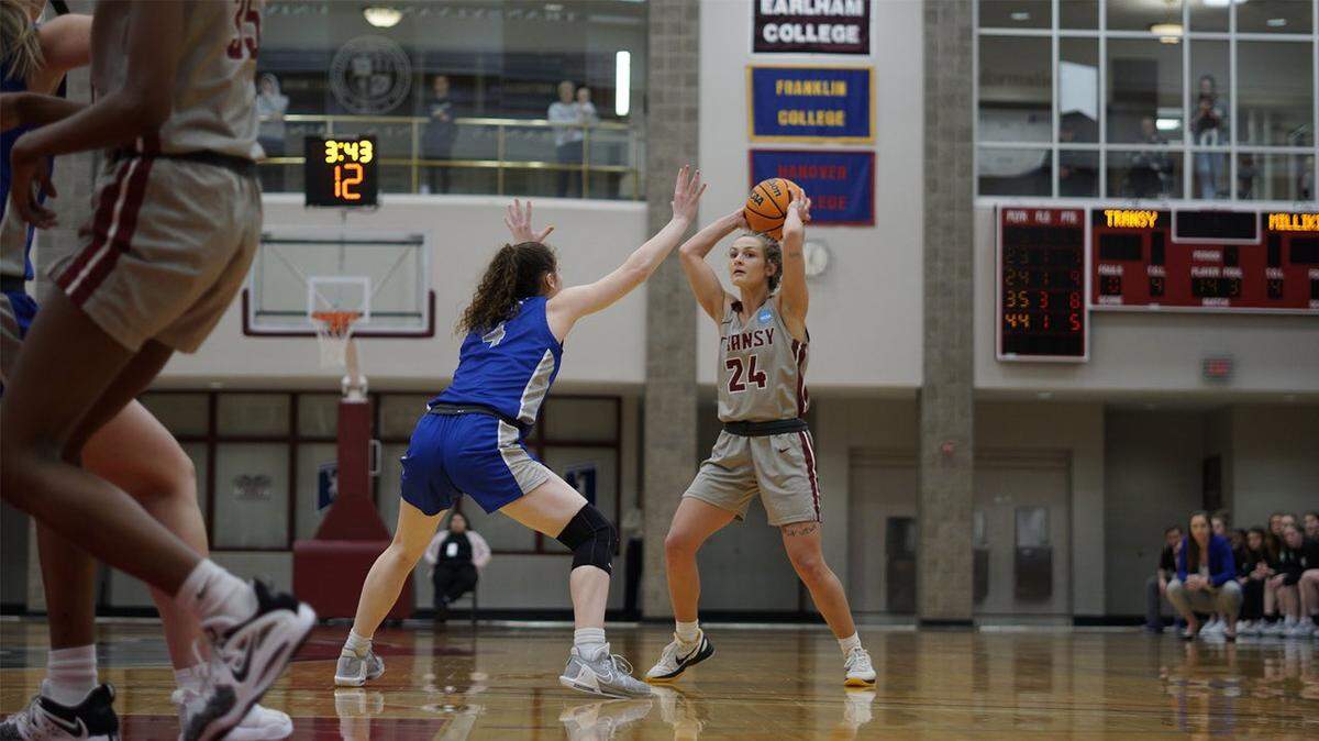 Transylvania’s Kennedi Stacy (24) looks to pass the ball during the Pioneers’ NCAA Division III Sweet 16 win against Ohio Northern on Friday in Lexington.