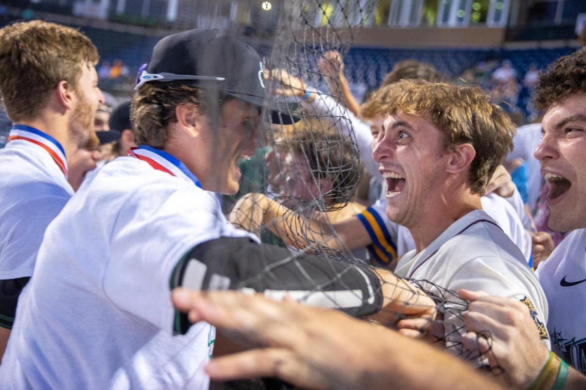 Louisville Trinity celebrates after winning the KHSAA State Baseball Tournament championship against McCracken County at Lexington Legends Ballpark on Saturday night. The Shamrocks prevailed 10-0 in five innings.