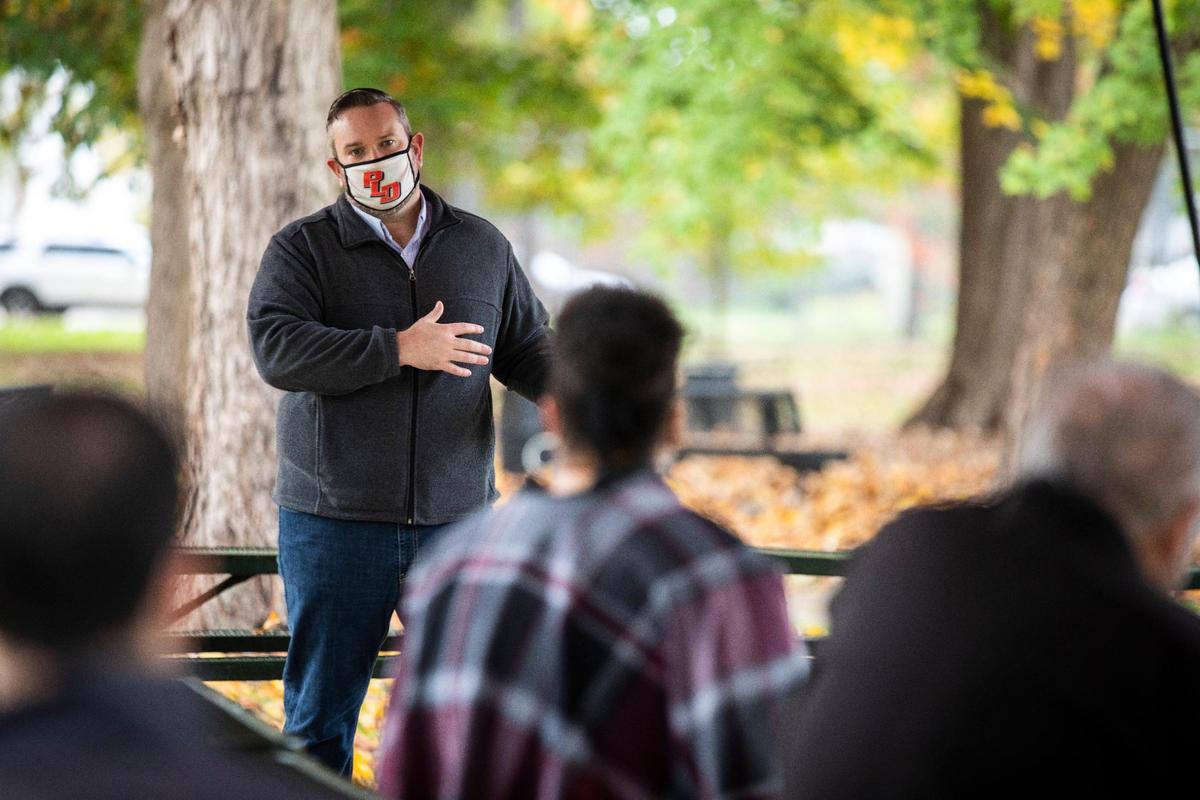 Candidate for U.S. Representative, Josh Hicks, holds a health care round table and speaks with people who attended the event at Woodland Park in Lexington, Ky., Tuesday, October 27, 2020. “I like my chances,” Hicks said.