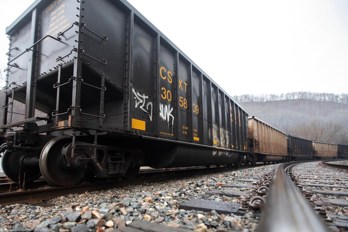 Miners, who say they haven’t been paid in three weeks, block a coal train in Pike County, Ky., Tuesday, Jan. 14, 2020.