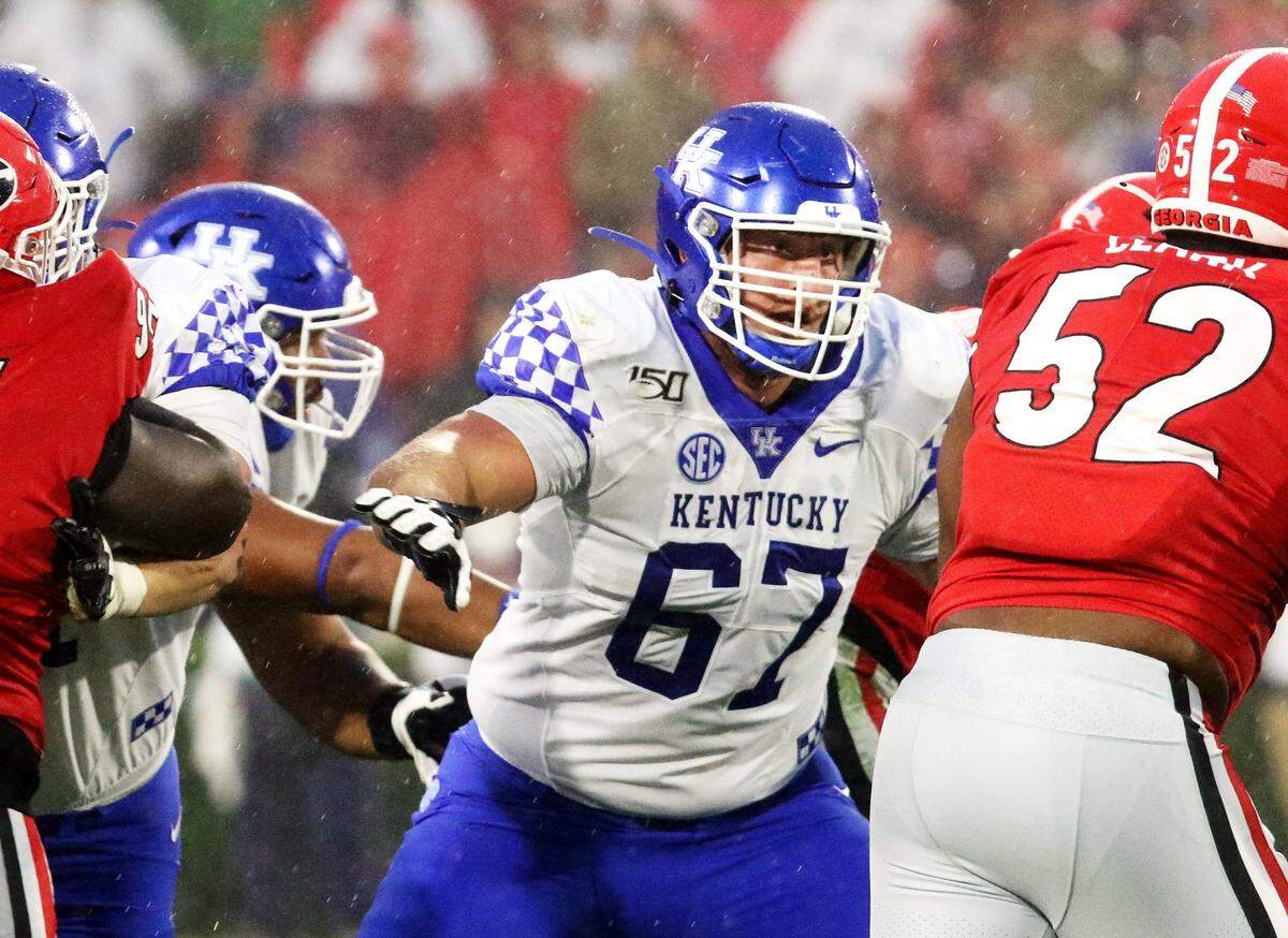 Kentucky senior left tackle Landon Young will wear No. 65 Saturday, the number worn by ailing UK offensive line coach John Schlarman during his Wildcats playing days.