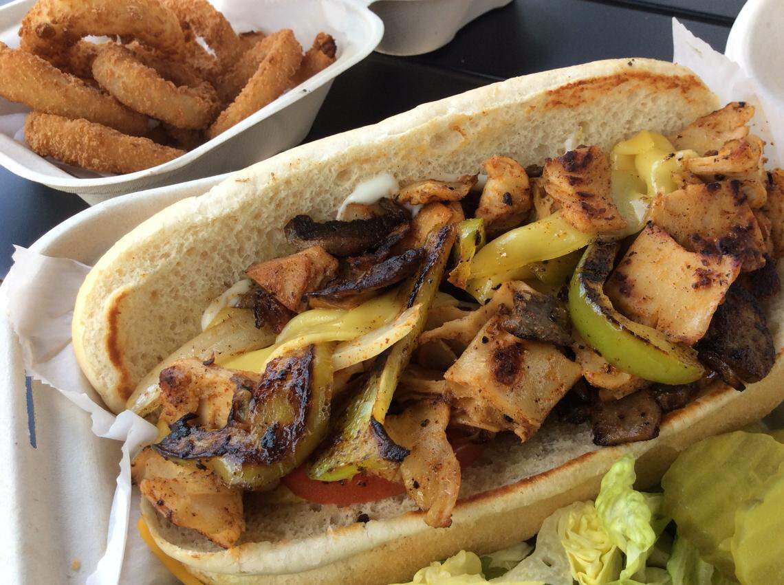 The Social Vegan in Greyline Station serves an all vegan menu including the Social-Licious Chicken Philly sandwich and onion rings.