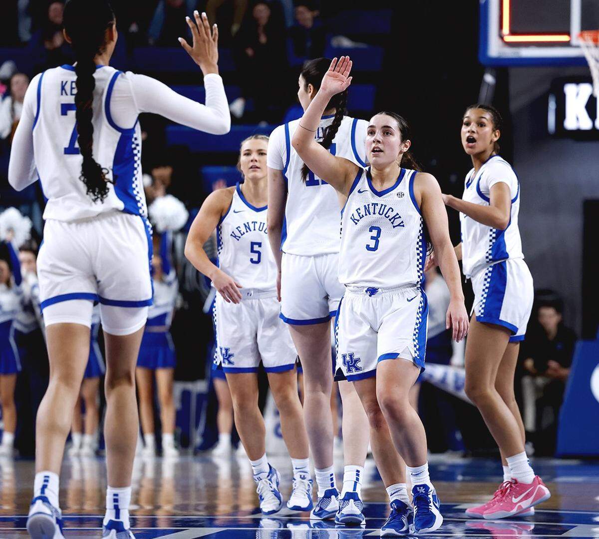 Georgia Amoore (3) and Teonni Key (7) prepare to share a high-five during Kentucky’s win over Georgia in Memorial Coliseum on Sunday. Amoore led UK with 21 points and seven assists. Key contributed 14 points and 14 rebounds.