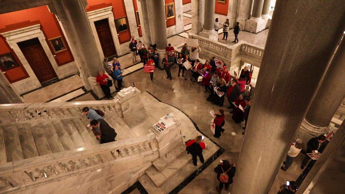 A crowd gathered in the Kentucky Capitol outside the House of Representatives to sing holiday carols with lyrics changed to protest governor Matt Bevin’s surprise legislative session Monday evening.