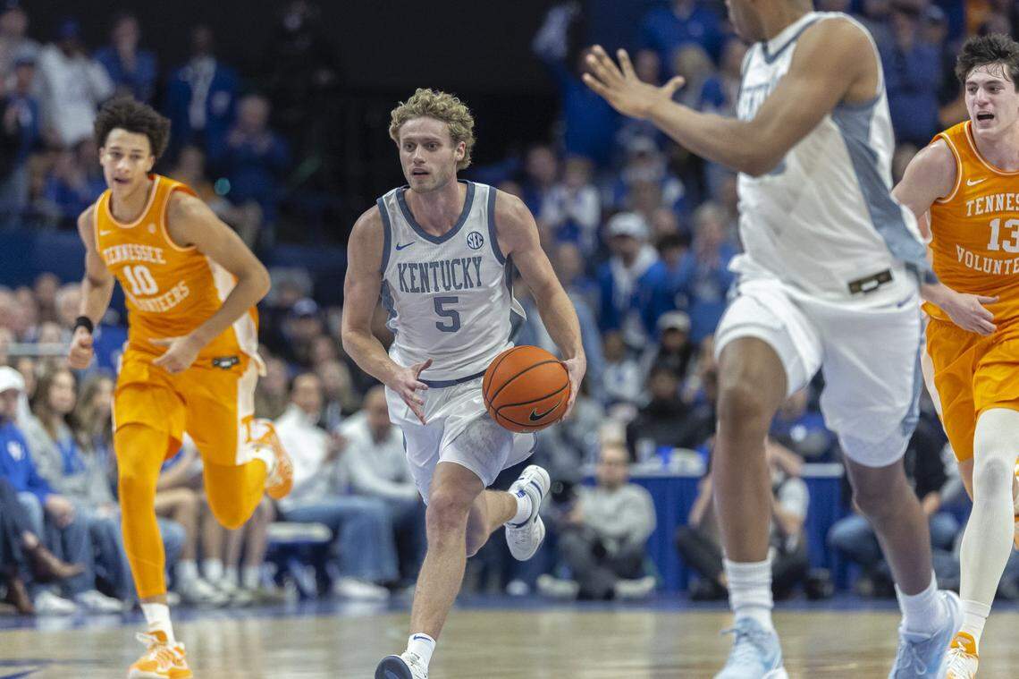 Kentucky basketball guard Collin Chandler (5) brings the ball down the court during Saturday’s game against Tennessee at Rupp Arena. UK wore retro denim uniforms for the game, which came as part of a celebration of the Wildcats’ 1996 NCAA championship team.
