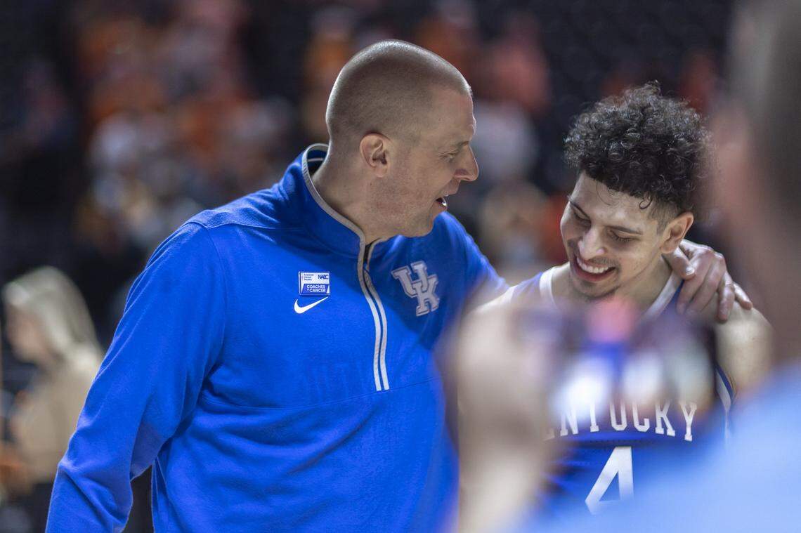 Kentucky head coach Mark Pope talks to guard Koby Brea (4) following Tuesday’s win against Tennessee at Thompson-Boling Arena in Knoxville, Tenn.