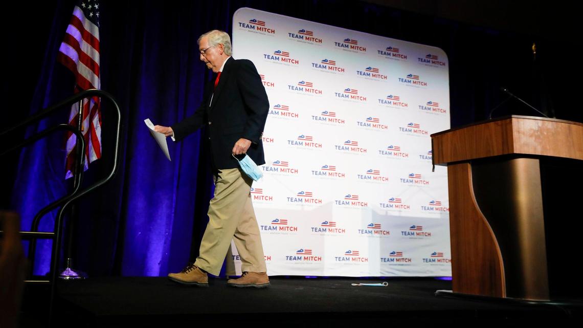 Republican Senate Majority Leader Mitch McConnell leaves the stage after giving remarks after winning reelection over Democratic challenger Amy McGrath at the Omni Hotel in Louisville, Ky., Tuesday, Nov. 3, 2020.