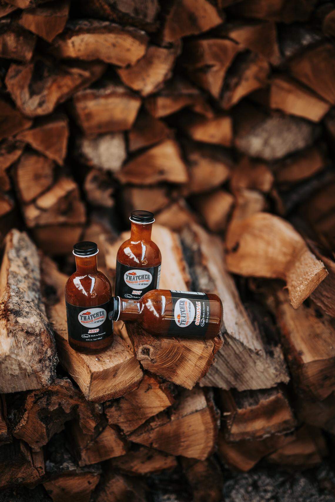 Red River Gorge BBQ restaurant Thatcher Barbecue Company bottles sauce for its dining spot and some Lexington places like Blue Door Smokehouse and Red State BBQ.