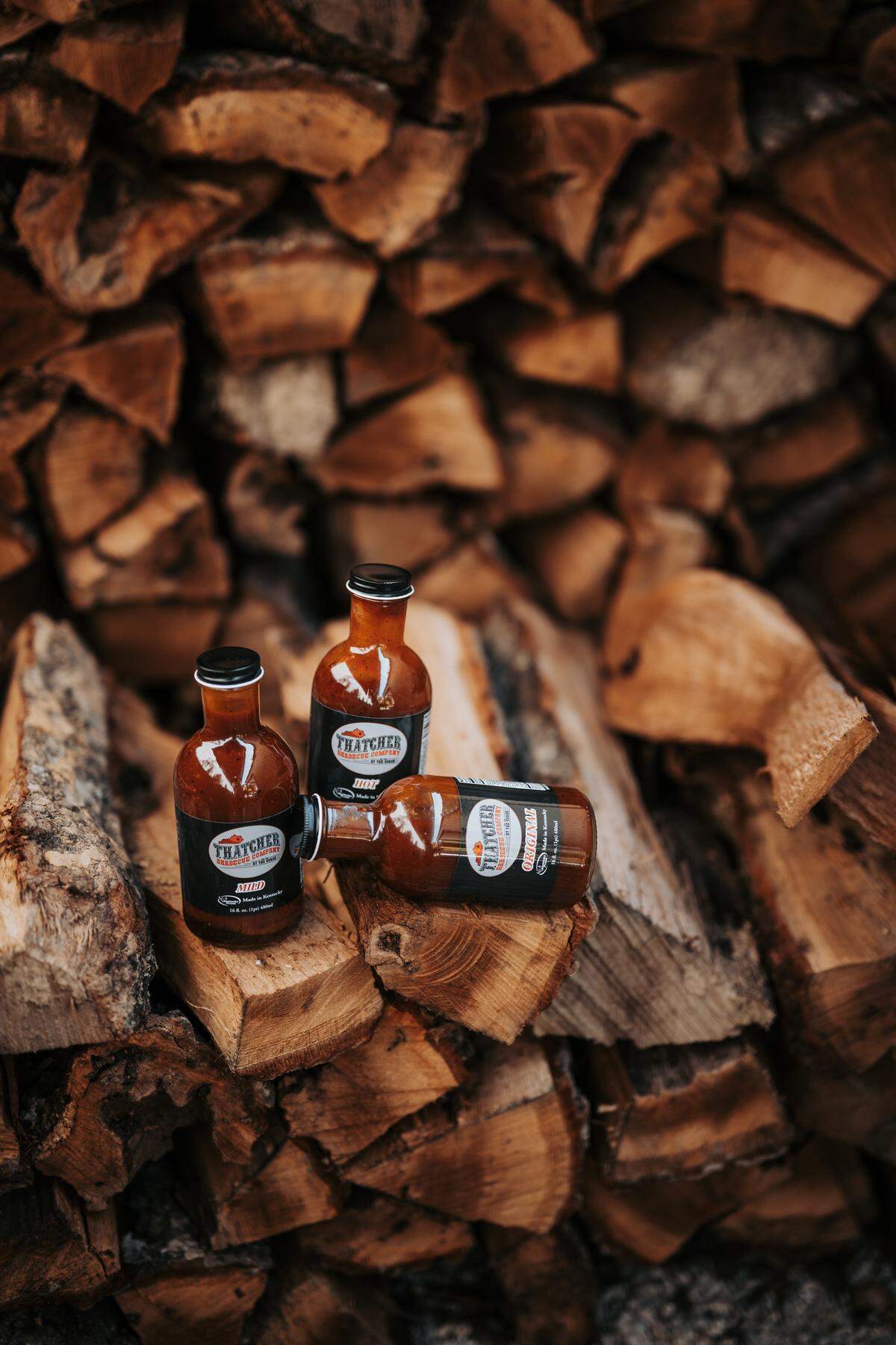 Red River Gorge BBQ restaurant Thatcher Barbecue Company bottles sauce for its dining spot and some Lexington places like Blue Door Smokehouse and Red State BBQ.
