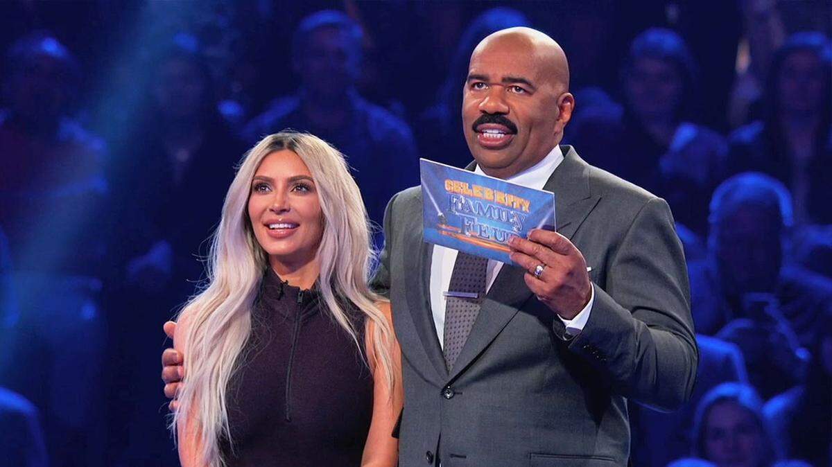 Kim Kardashian plays “Family Feud” with host Steve Harvey. The show will soon be holding auditions in Louisville.