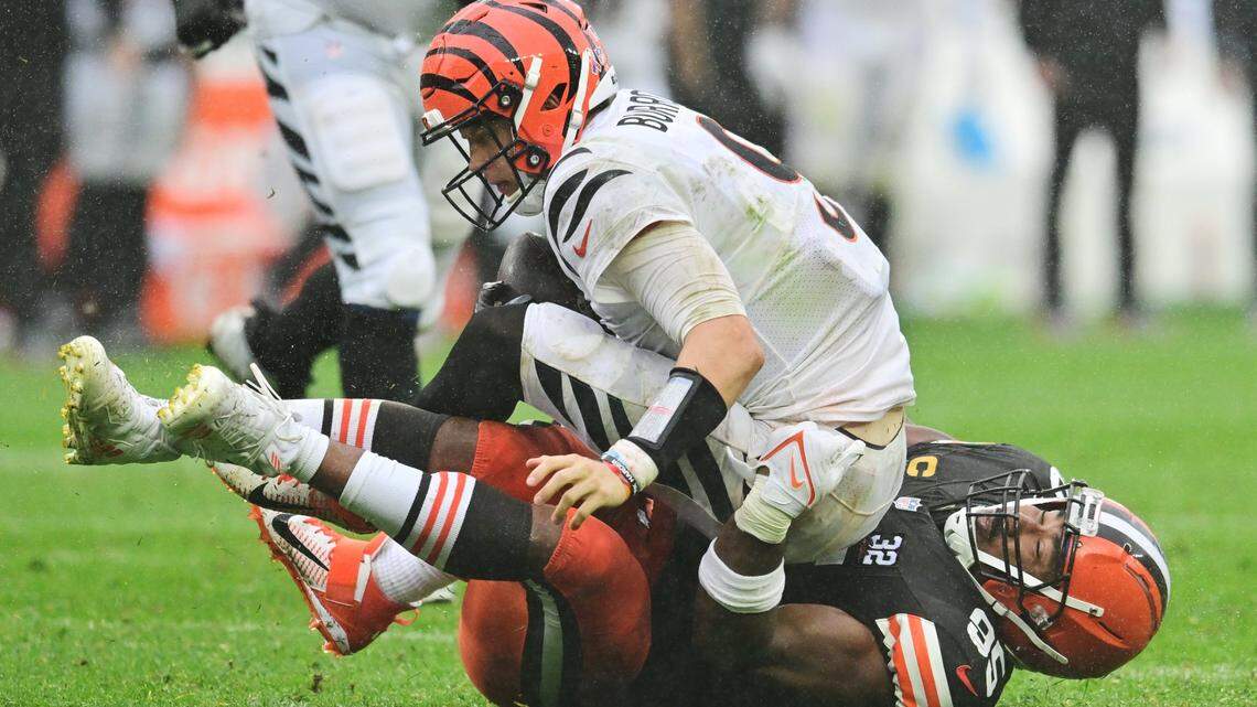Sep 10, 2023; Cleveland, Ohio, USA; Cleveland Browns defensive end Myles Garrett (95) sacks Cincinnati Bengals quarterback Joe Burrow (9) during the fourth quarter at Cleveland Browns Stadium. Mandatory Credit: Ken Blaze-USA TODAY Sports