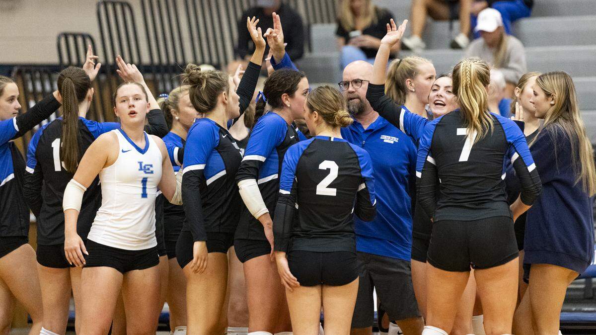Lexington Catholic coach Jeff Kaufmann, center-right, spoke to his team at a timeout during the Knights’ 3-0 win over West Jessamine on Thursday at Lexington Catholic High School.