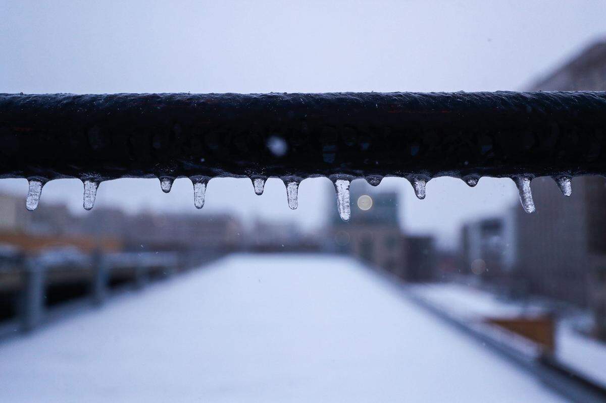A winter storm left behind layers of ice, sleet and snow for many residents across Kentucky.
