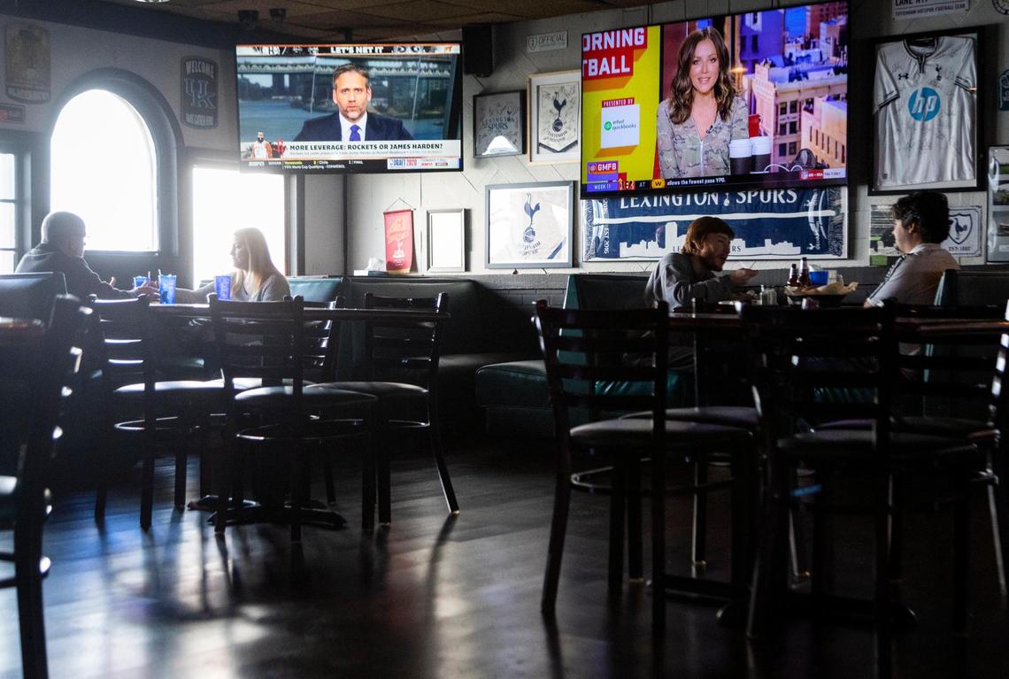 Patrons dine Wednesday at Lexington’s Shamrock Bar & Grille. Beginning Friday, restaurants and bars will be closed to indoor seating until Dec. 13.