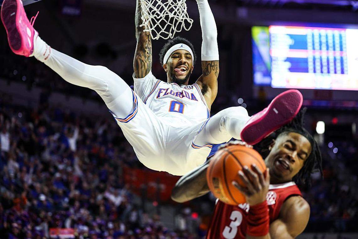 GAINESVILLE, FLORIDA - FEBRUARY 1: Boogie Fland #0 of the Florida Gators dunks the ball during the first half of a game against the Alabama Crimson Tide at the Stephen C. O'Connell Center on February 1, 2026 in Gainesville, Florida. (Photo by James Gilbert/Getty Images)