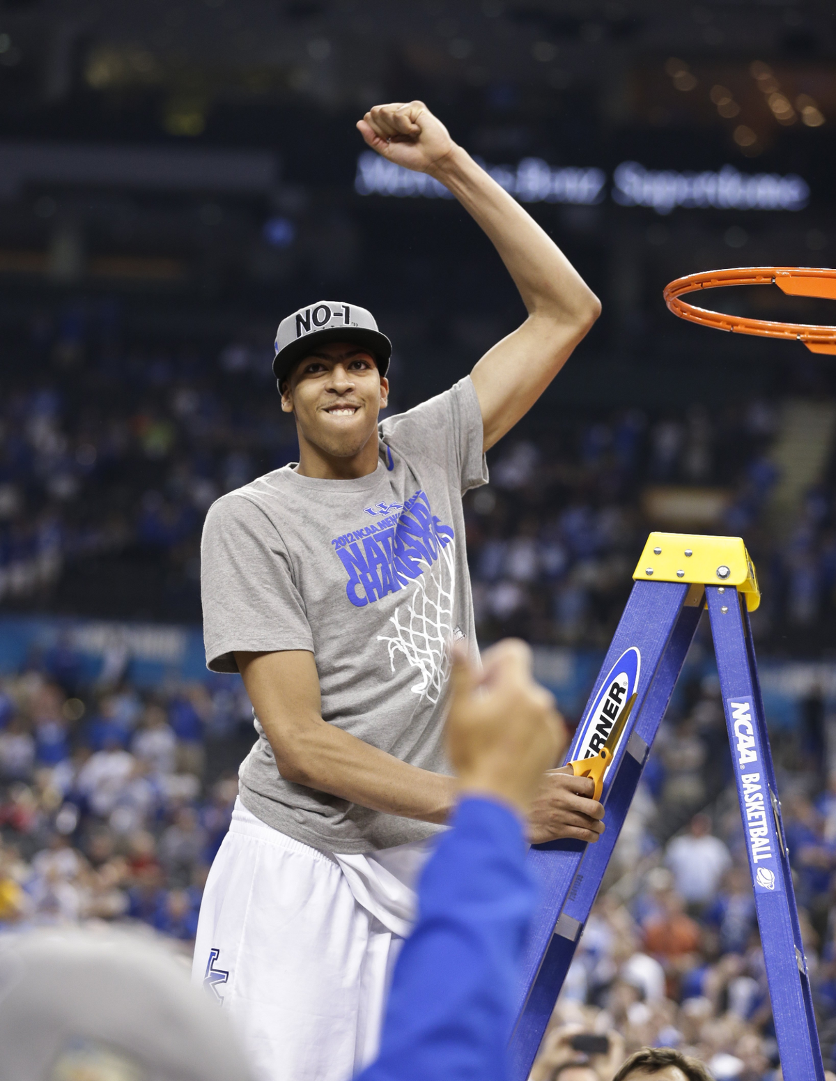 Kentucky’s Anthony Davis pumped a fist to the crowd after UK defeated Kansas 67-59 for the program’s eighth national championship, April 2, 2012 in New Orleans. Two nights earlier UK faced rival U of L for the first time ever in the Final Four. John Calipari’s Wildcats defeated Rick Pitino’s Cardinals 69-61 in the much-anticipated matchup. For the two games, Davis was named the Final Four’s Most Outstanding Player, scoring 24 points, grabbing 30 rebounds and blocking 11 shots