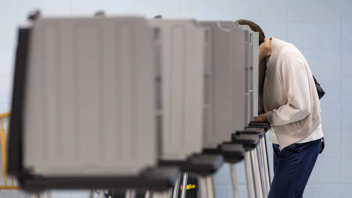 A voter casts their ballot in the 2026 primary election at Julius Marks Elementary School, May 19, 2026, in Lexington, Ky. Voters went the polls on primary election day across Kentucky to decide who will be on the ballot in November for major races across the commonwealth.