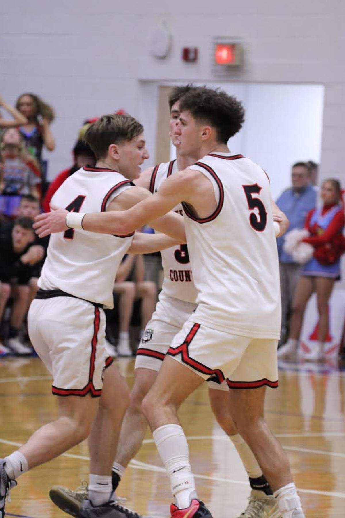 Lawrence County High School basketball players Kaiden Harris (4), Kaden Johnson (5) and Gunnar Woods (3) have helped lead the Bulldogs to the Boys’ Sweet Sixteen for only the second time in school history.