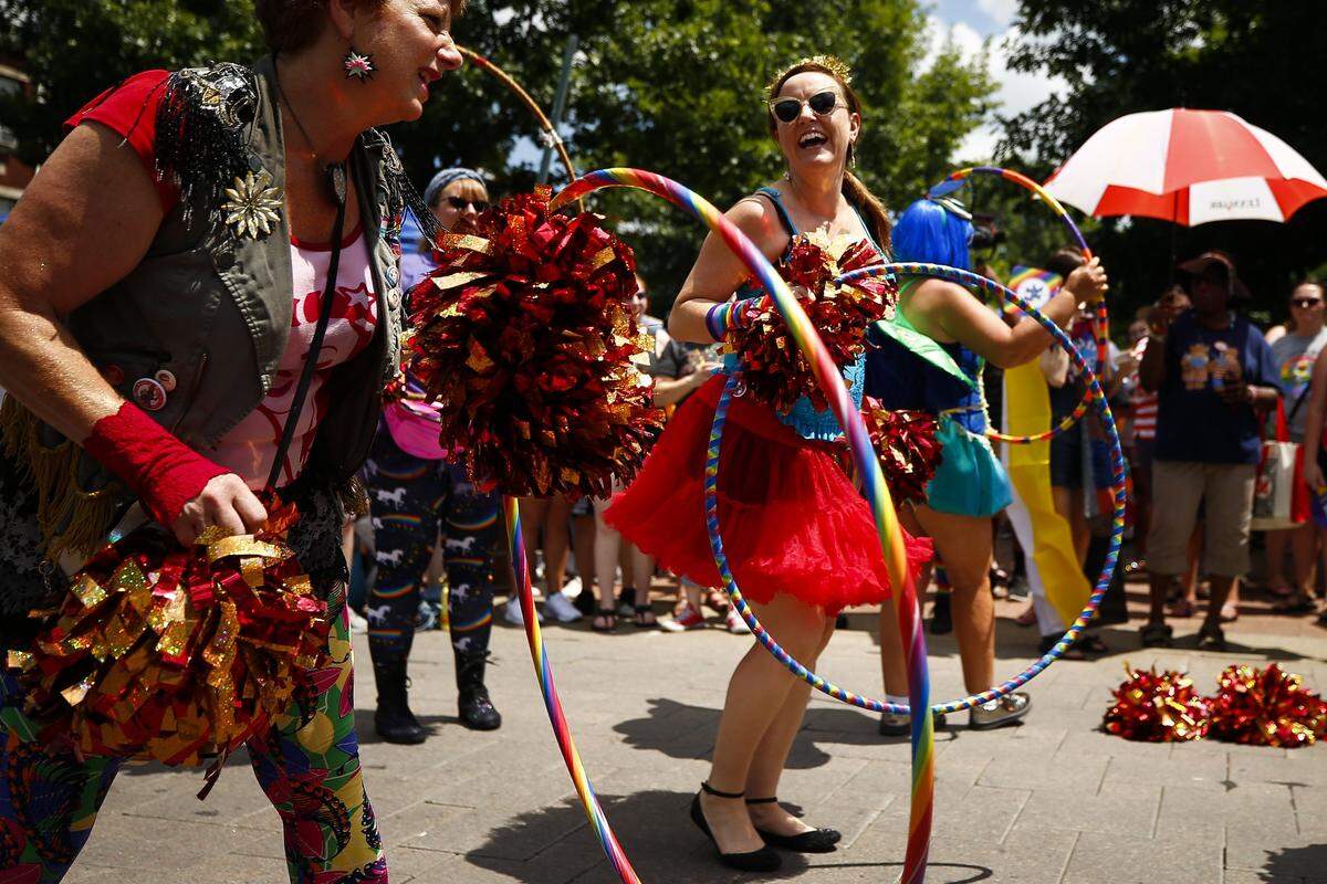 Erica Ulman, of Lexington, center, performed with the March Madness Marching Band during Lexington Pride Festival 2018 Saturday at courthouse plaza in Lexington.