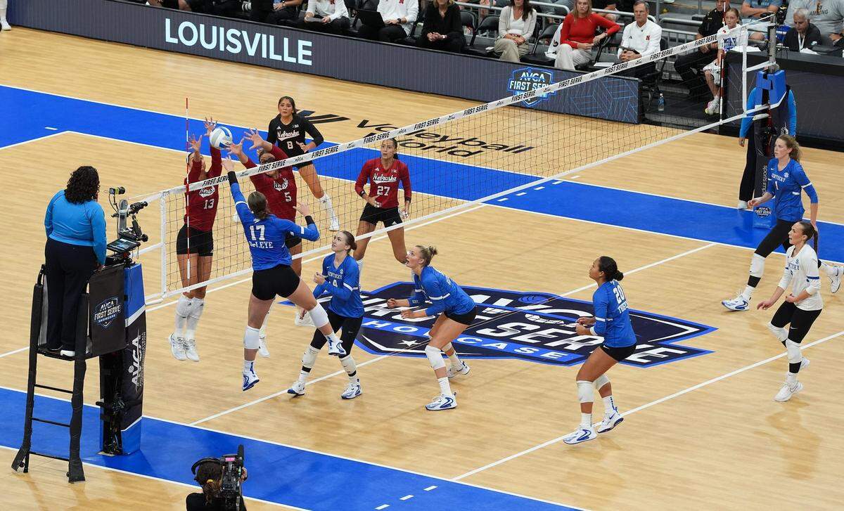Second-ranked Nebraska scratched out a 25-21, 22-25, 25-15, 25-20 season-opening win over No. 9 Kentucky at the KFC Yum Center.