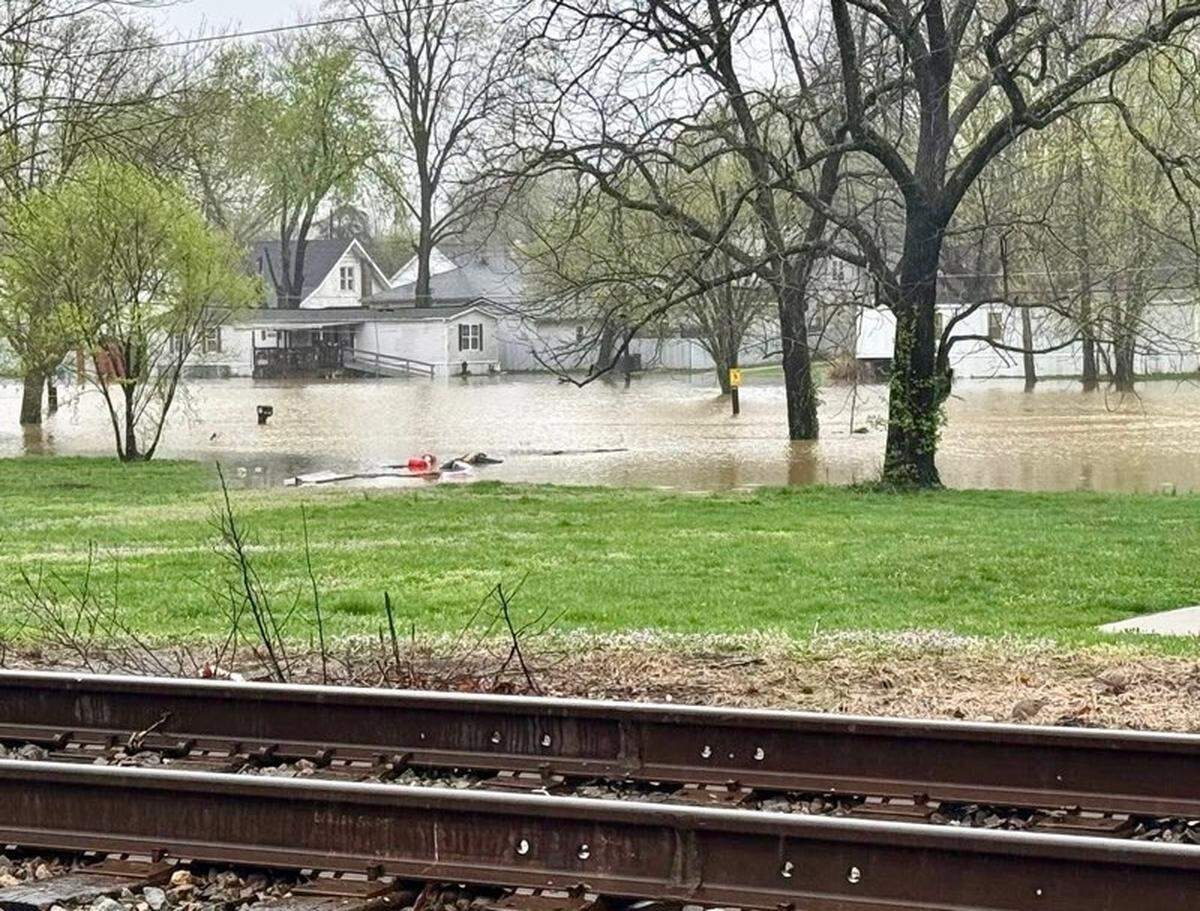 Floodwaters continued to rise Sunday, April 6, 2025 in Falmouth. Pendleton County officials issued emergency evacuation orders for Falmouth and Butler on Saturday, and access to much of Falmouth and all of Butler was cut off Sunday.
