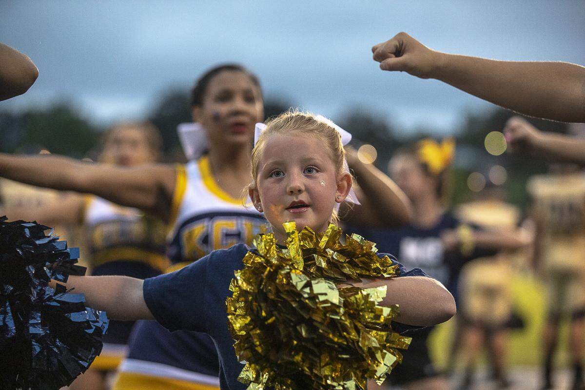 Annabelle Smith, 6, of Barbourville, cheers with the Knox Central cheerleaders during last Friday’s game against Ashland Blazer.