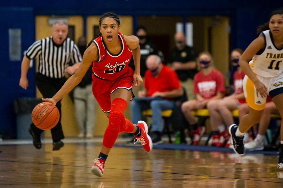Anderson County’s Amiya Jenkins (20) stole the ball and drove upcourt at Franklin County High School in Frankfort on Tuesday. Jenkins led all scorers with 24 points.