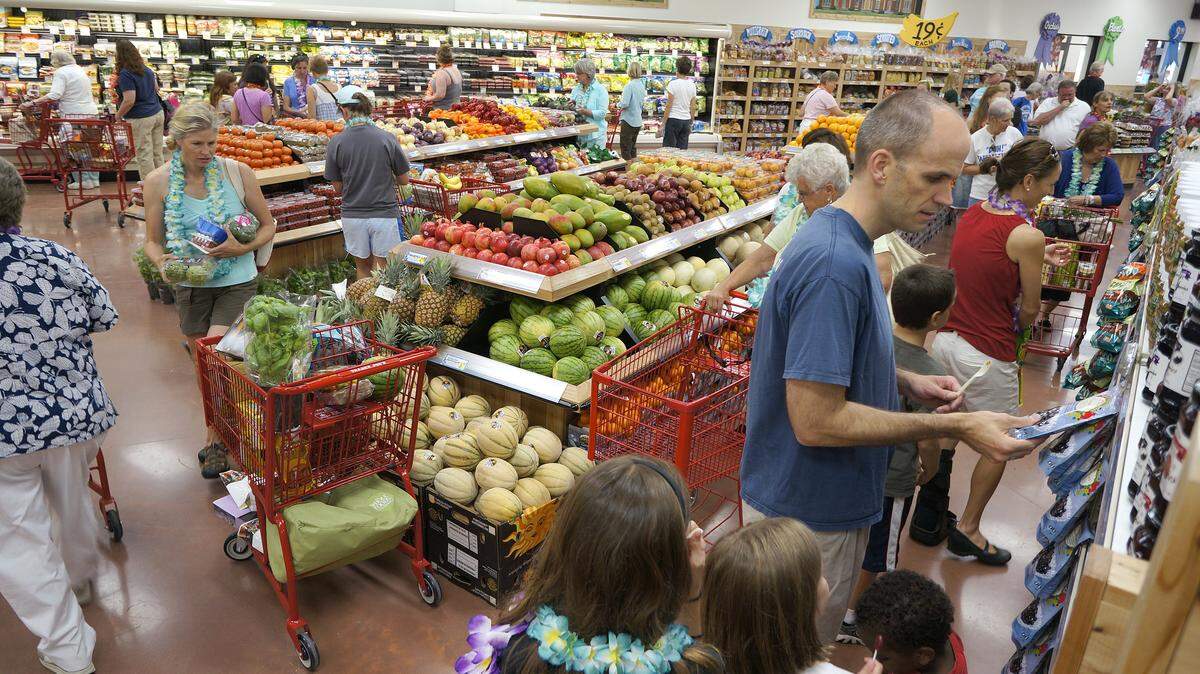Many major grocery chains will be open Tuesday for the Fourth of July. Trader Joe’s, seen here on opening day in 2012, will be open reduced hours.