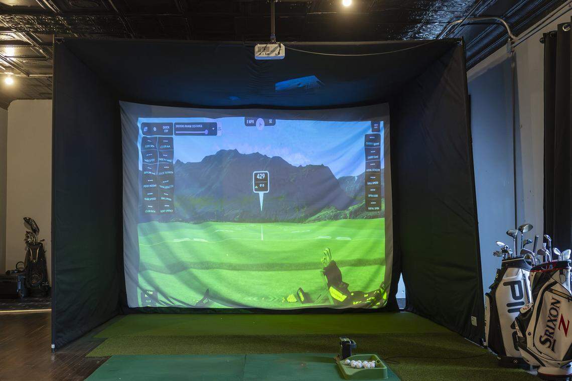 The golf simulator at Birdies & Barrels offers access to more than 3,200 courses –  including local courses like Keene Trace, Woodson Bend and General Burnside Island.