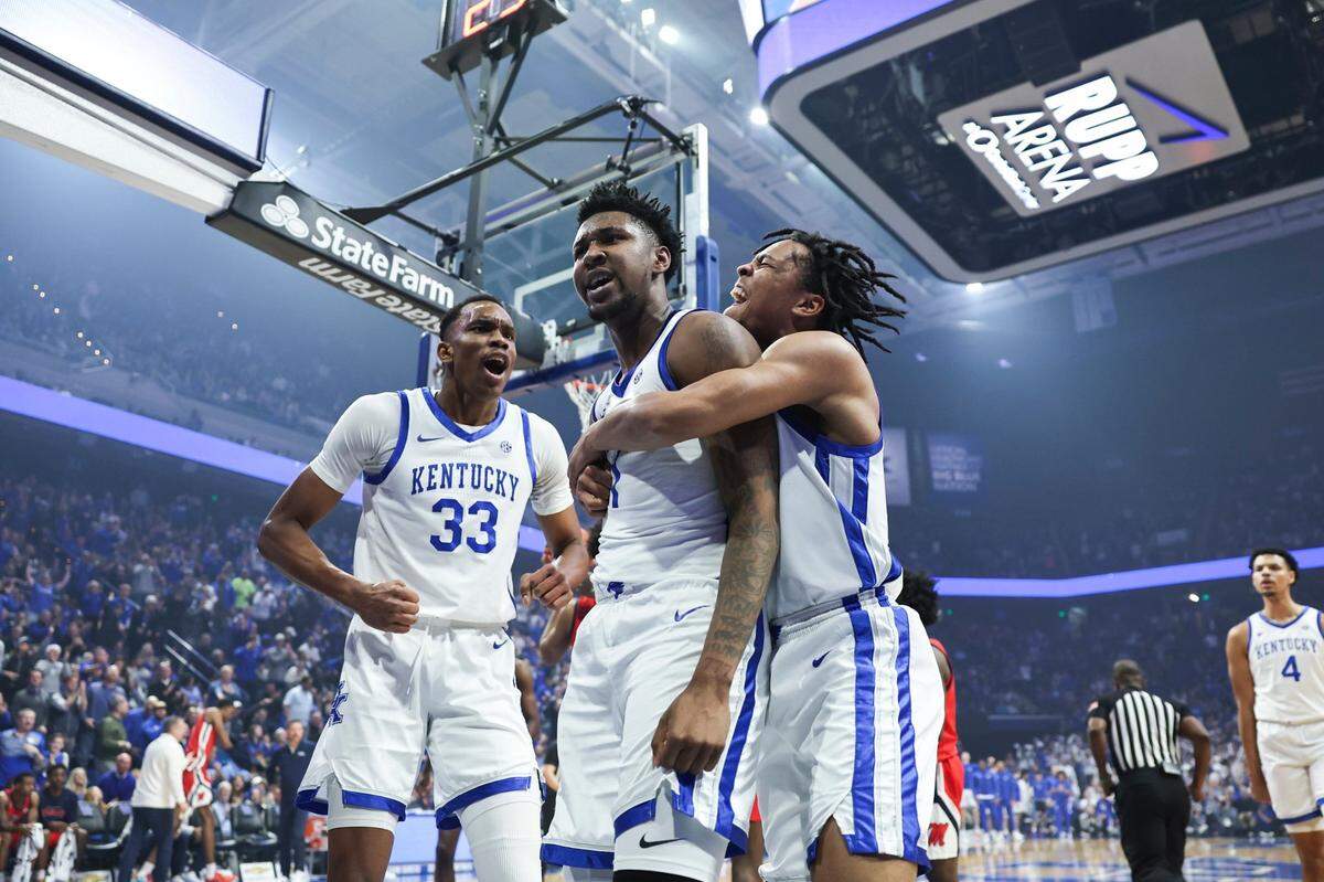 Kentucky guard Justin Edwards (1) celebrates scoring and drawing a foul against Mississippi during Tuesday’s game at Rupp Arena.
