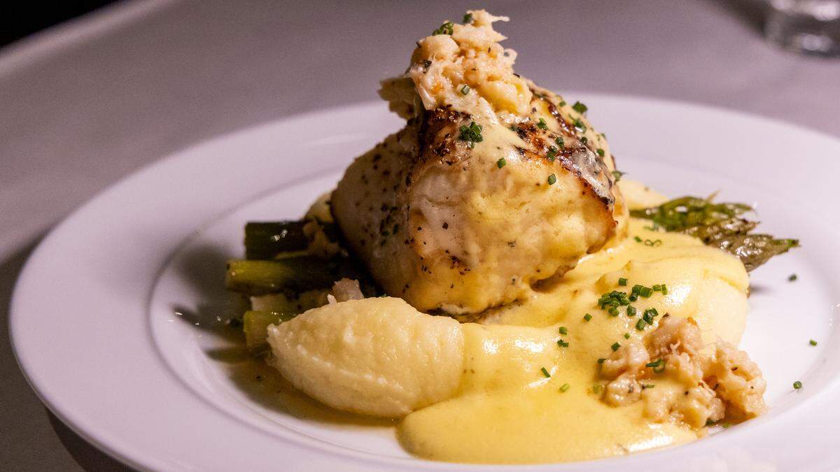 Sea Bass Oscar Style at Carson’s Back Porch ($46) is topped with lobster, crab, shrimp and house-made Béarnaise sauce on top of mashed potatoes and asparagus. 