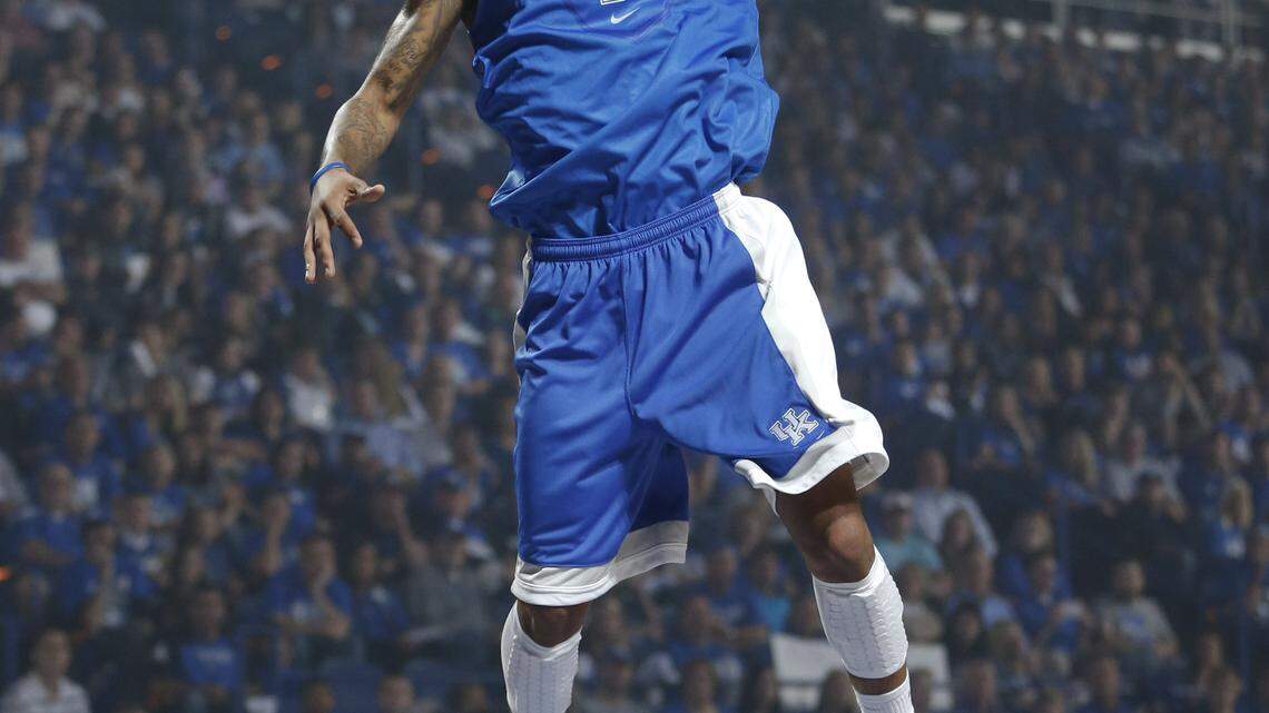 Kentucky guard James Young (1) went in for a dunk during Big Blue Madness Friday.