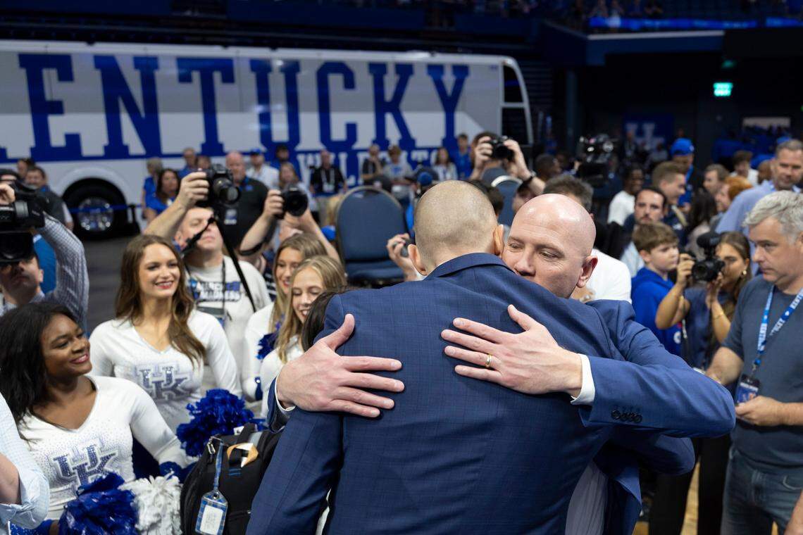 New Kentucky basketball head coach Mark Pope hugs former teammate and roommate Jeff Sheppard after an introductory event at Rupp Arena in Lexington, Ky, Sunday, April 14, 2024.
