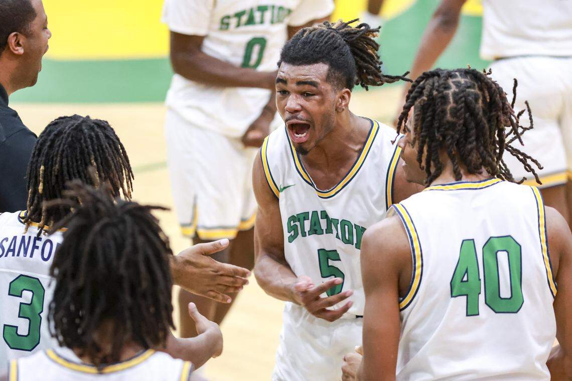 Bryan Station's Amari Owens celebrates after scoring a point during the boys 42 District Tournament Semifinal at Bryan Station High School in Lexington, Kentucky, on Wednesday, Feb. 25, 2026.