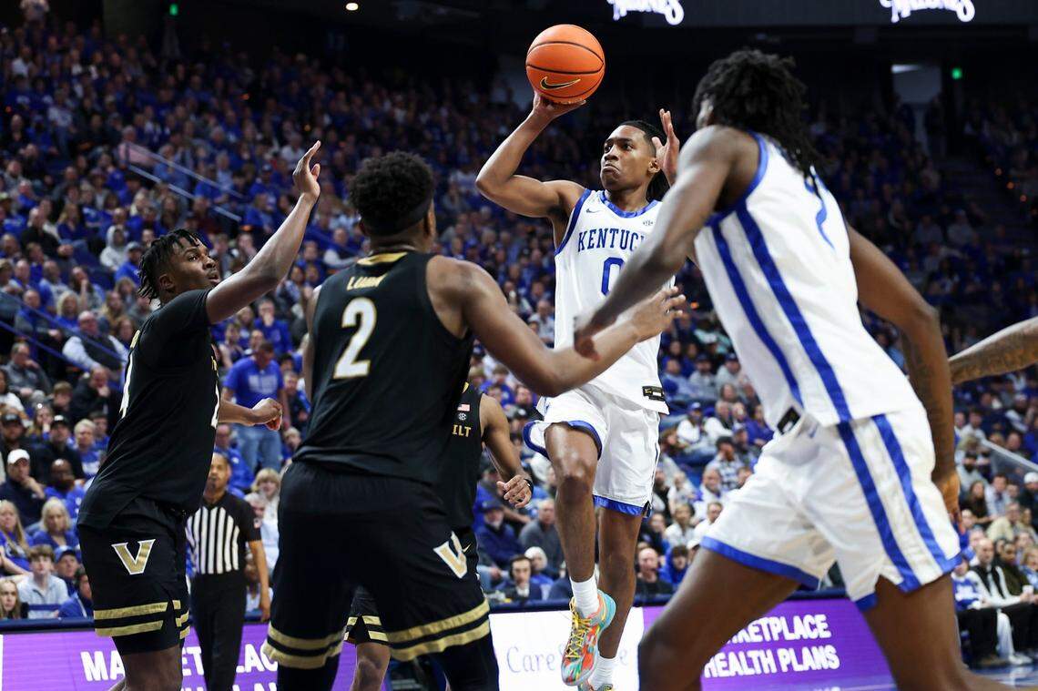 Kentucky guard Rob Dillingham (0) shoots the ball against Vanderbilt forward Ven-Allen Lubin (2) during Wednesday’s game at Rupp Arena.