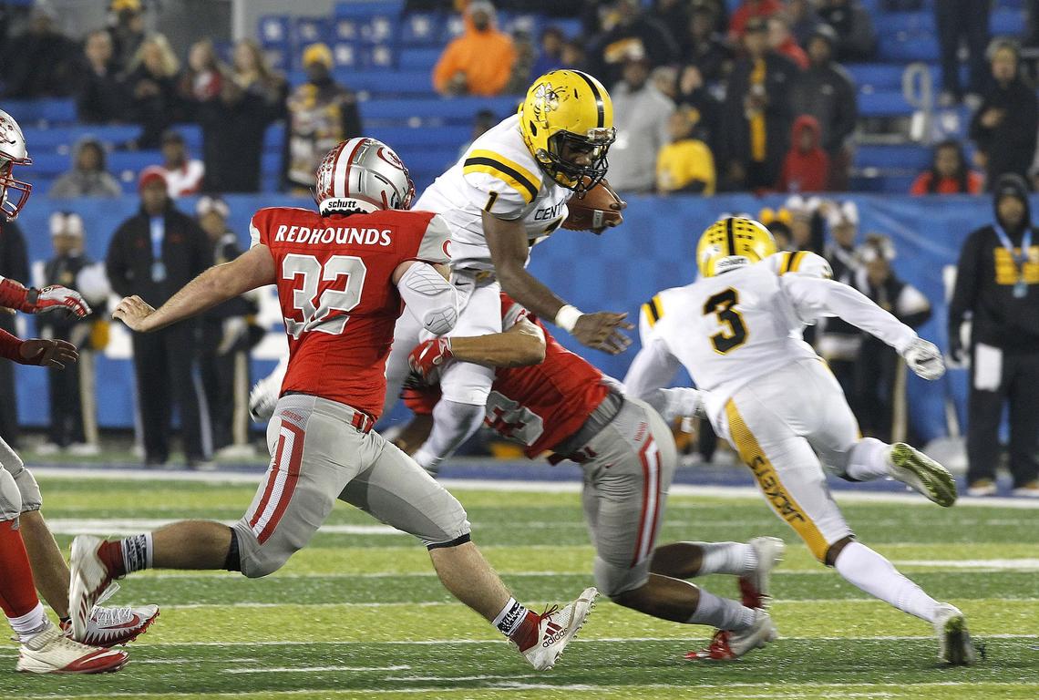 Central quarterback Malik Goodall leapt as he ran against Corbin Friday in the Class 3A KHSAA Commonwealth Gridiron Bowl.