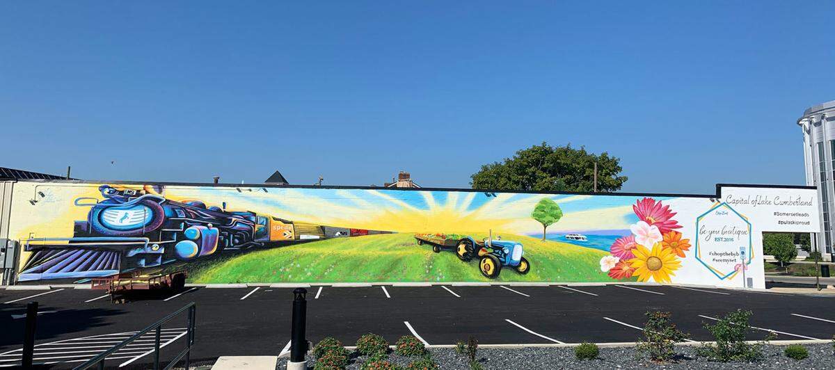 A mural painted in downtown Somerset in 2020 pays tribute to agriculture and other influences on the community.