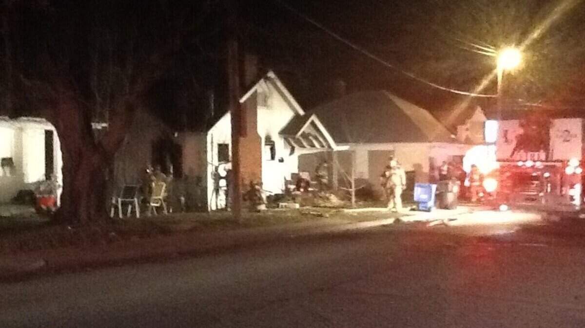 Firefighters put out flames on Sherman Avenue in Lexington.