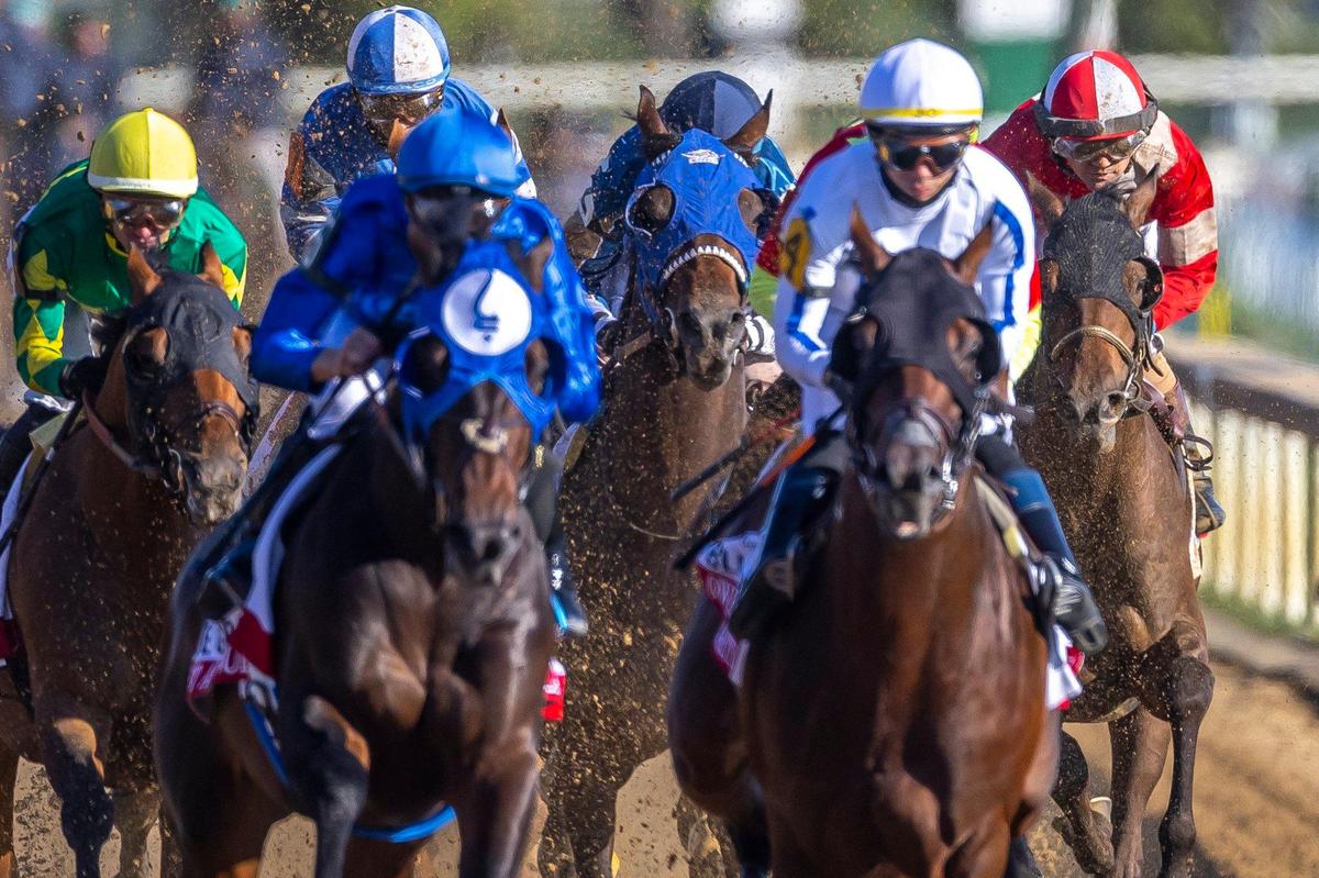 Burnham Square, with Brian Hernandez Jr. up, far right, won the 101st Blue Grass Stakes at Keeneland on April 8. One of the other runners in the Blue Grass, Owen Almighty, will not race in next month’s Kentucky Derby despite having enough qualifying points to do so.