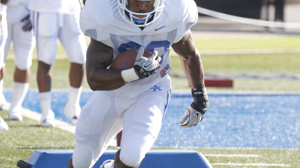 Freshman running back Josh Clemons ran drills on Monday. He rushed for 2,003 yards and 25 touchdowns last season.