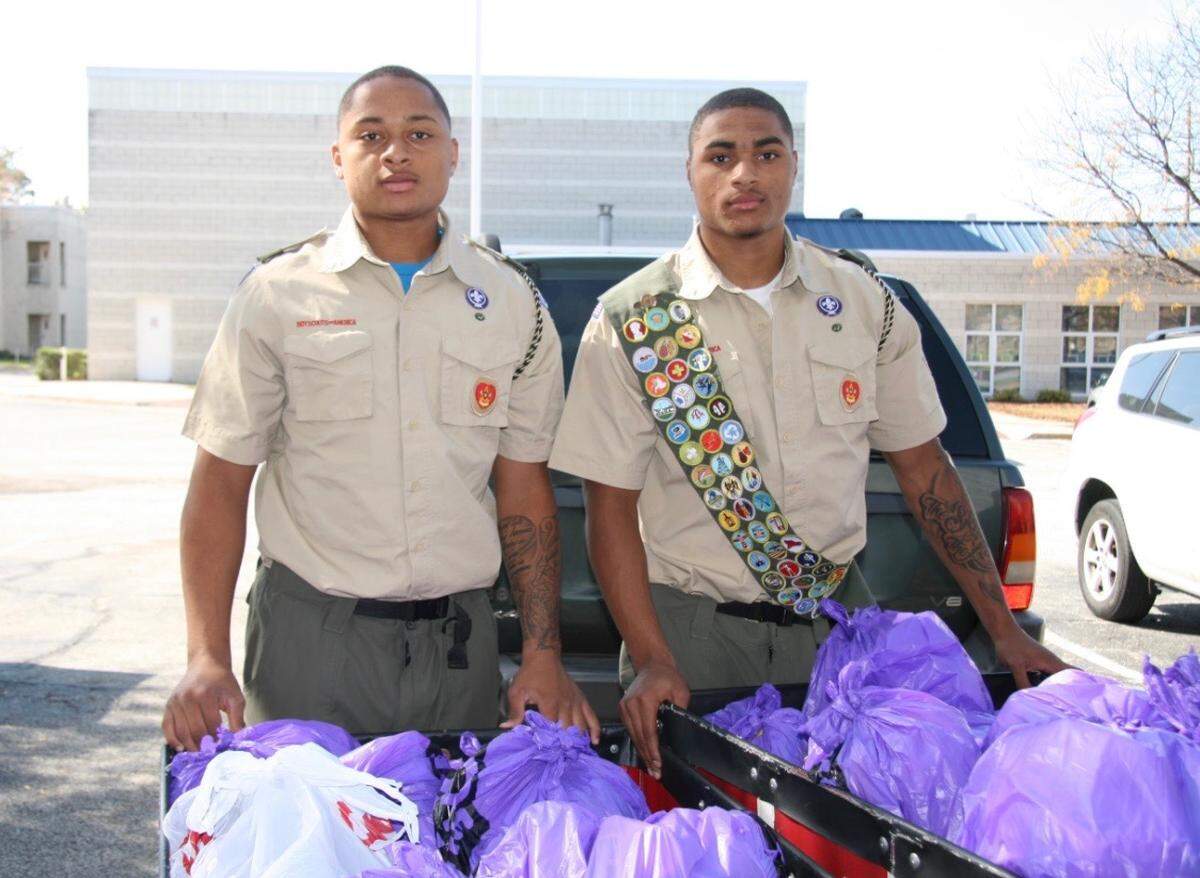 De’Sean Rose, left, and A.J. Rose, right, remained part of the Boy Scouts of America through high school, and achieved Eagle Scout status. Only 4 percent of all Boy Scouts have earned that distinction.