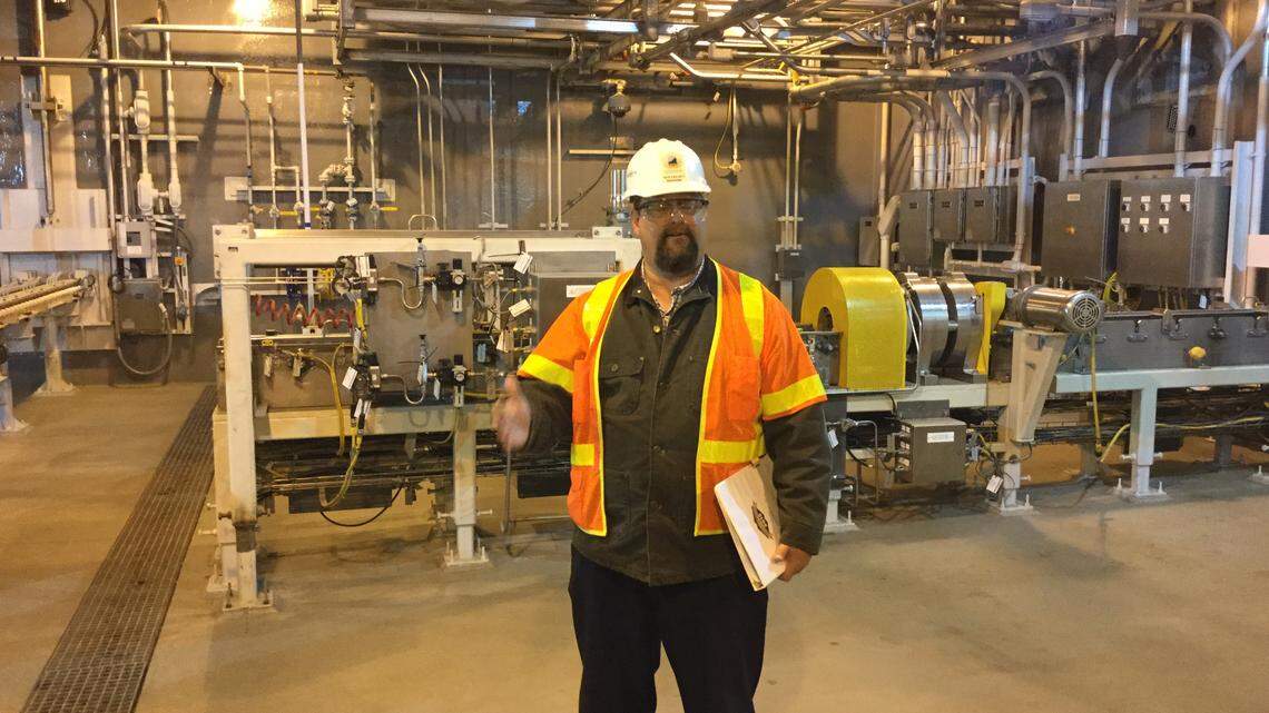 Jeff Brubaker, site project manager for the plant that will destroy chemical weapons, stood near equipment that will separate the warhead containing nerve agent from the rocket propellant. Brubaker led a tour Tuesday of the finished plant. Photo by Greg Kocher | Staff