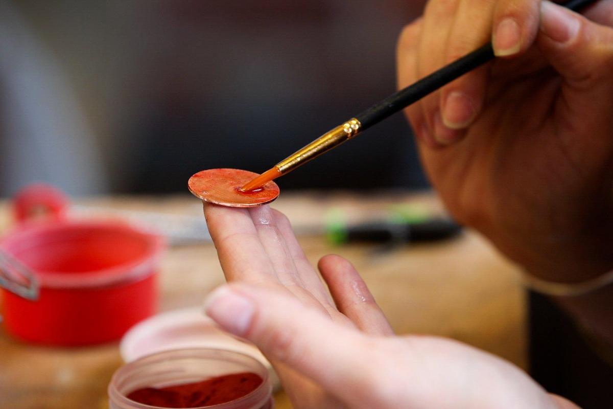 Becky Brown works on a piece of jewelry on Friday, July 1, 2022, at Becky Brown Studio and Gallery in Berea.