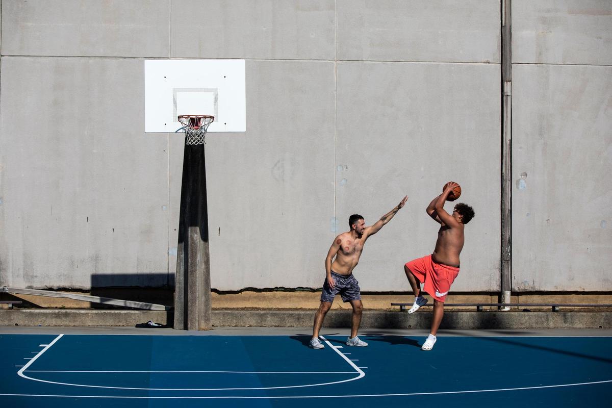 Brothers Zach and Bubba Thompson play basketball on UK’s campus in Lexington, Ky., Tuesday, June 21, 2022.