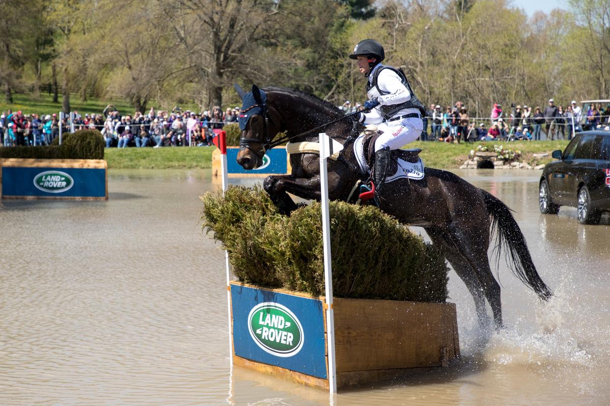 Michael Jung aboard Fischerrocana FST jumping at The Head of the Lake during the Land Rover Kentucky Three Day Event Cross Country Competition at the Kentucky Horse Park in 2018.