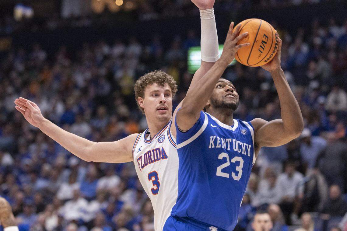 Kentucky Wildcats forward Mouhamed Dioubate (23) shoots the ball as Florida Gators center Micah Handlogten (3) defends during the SEC Tournament at Bridgestone Arena in Nashville, Tenn., on Friday, March 13, 2026. 